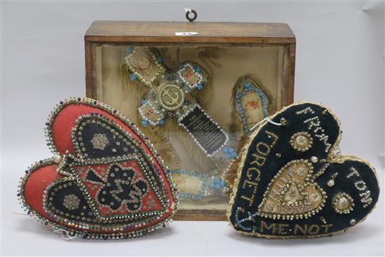 Two Sailors love token cushions and a cased embroidery anchor